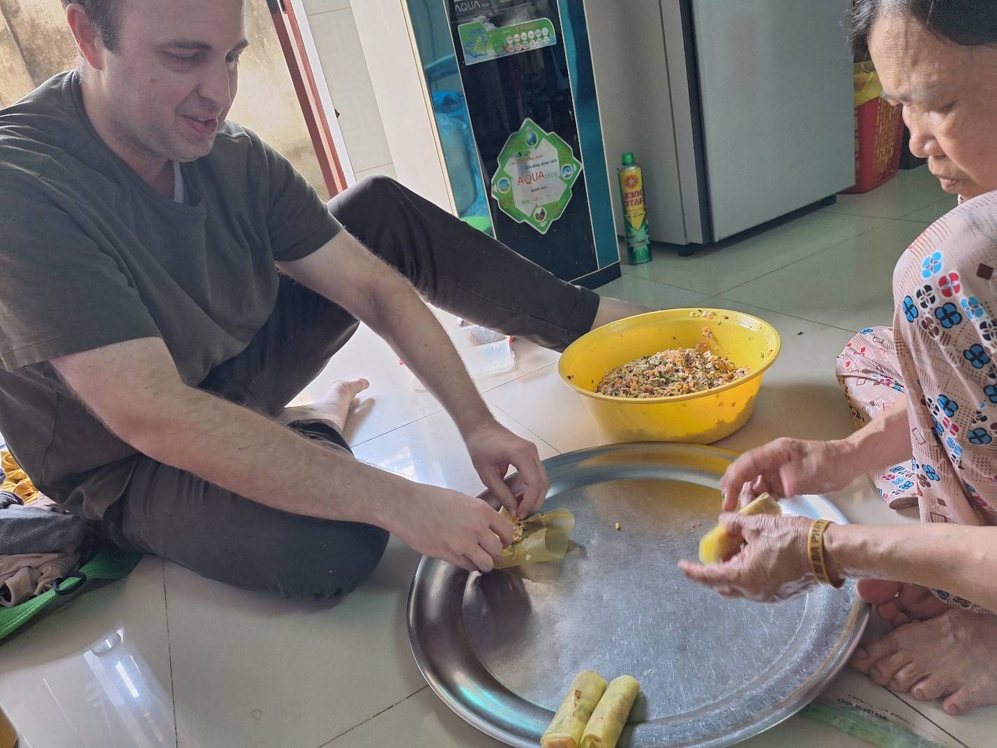 Brad and Vi’s mother are working together to make the rolls