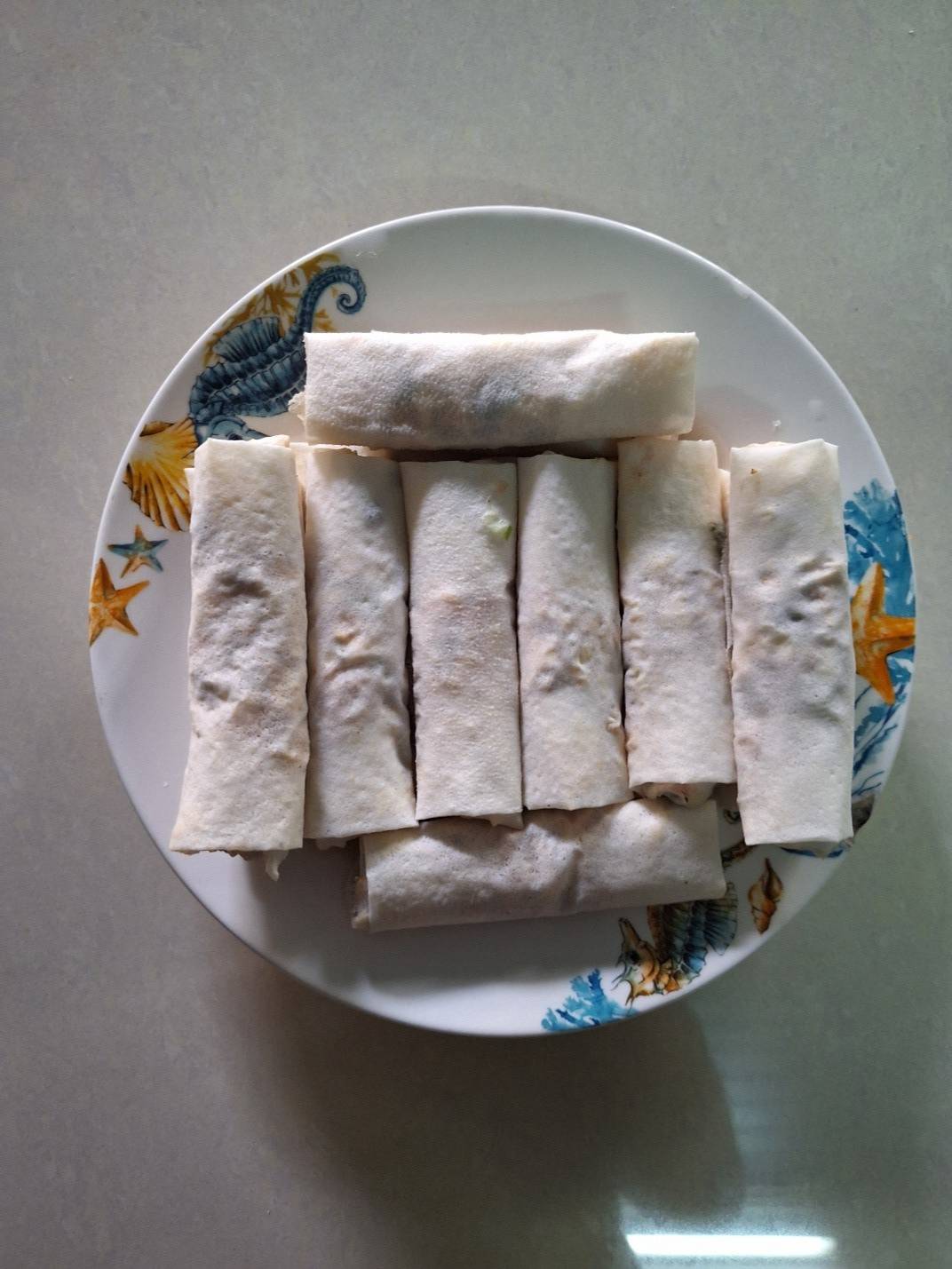 Brad and Vi’s mother are working together to make the rolls