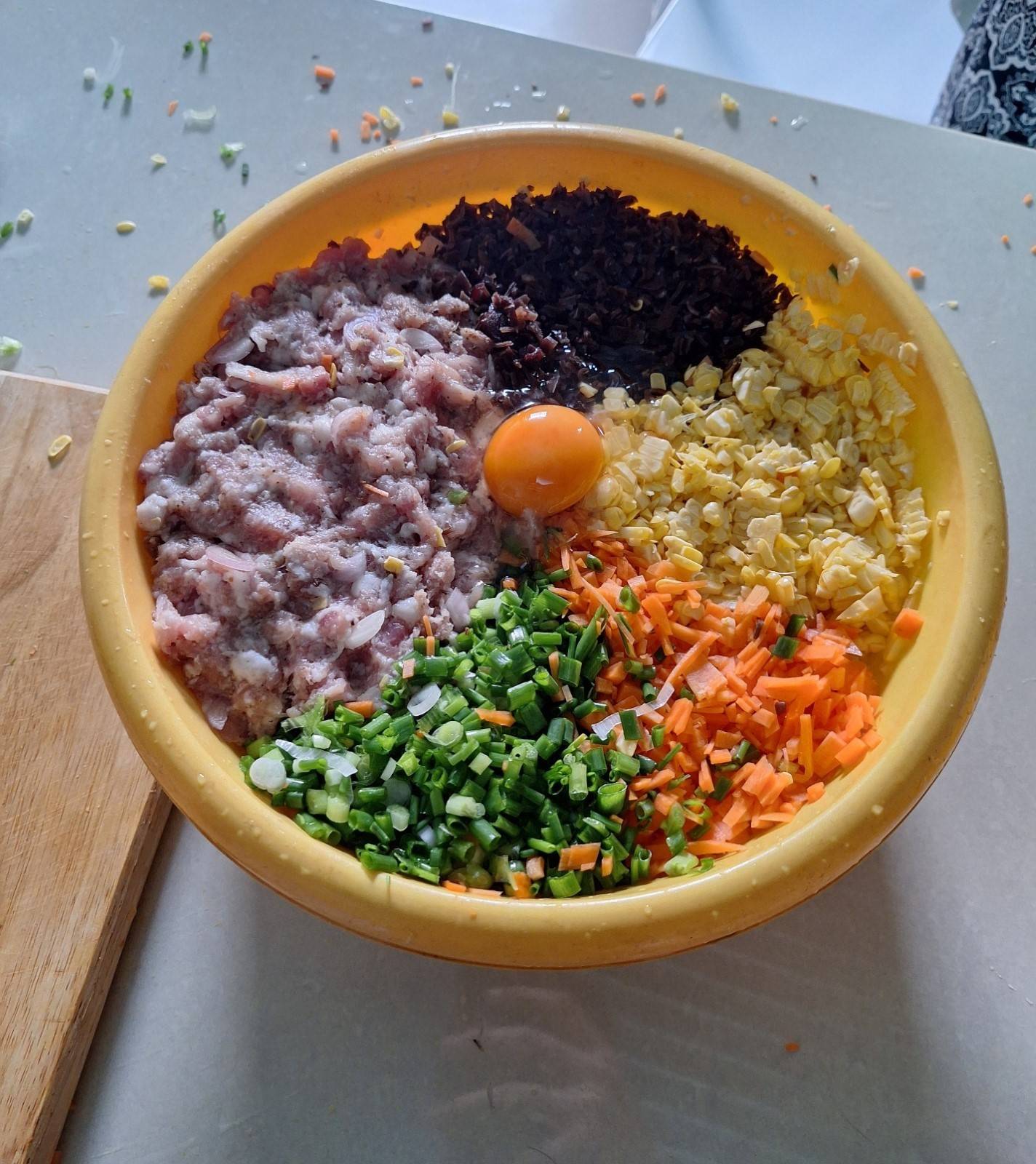 See some of the ingredients gathered together, ready to be inserted into a roll